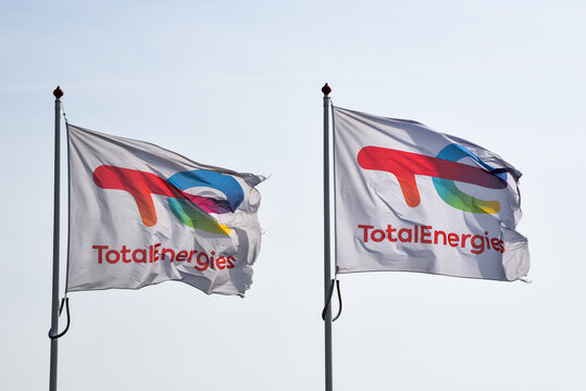 Den Helder, Netherlands. May 2, 2023. Flying flags of Total Energies, a major oil company.