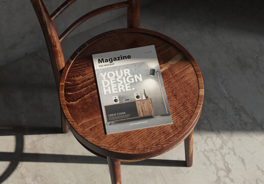 Magazine or book cover Mockup on wooden chair in room
