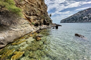 Sea coastline seen from an engulfed beach in Greece. - 615417158