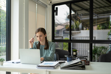 Fototapeta premium Busineswoman working on laptop.