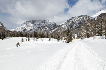 Fototapeta na wymiar Panoramic road on way up to Tre Cime di Lavaredo completely snowy; Misurina, Auronzo di Cadore, Province of Belluno, Dolomites, Italy