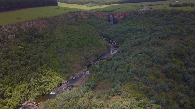 South Africa aerial drone Lisbon Berlin Falls waterfalls Sabie cinematic Kruger National Park partially cloudy lush spring summer green stunning river landscape bush slowly forward pan up movement