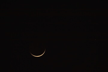 Tonight, the gentle light of the waxing crescent moon begins to adorn the sky.