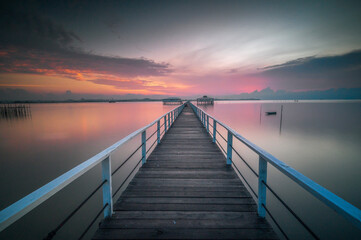 Wooden jetty on the sea at beautiful sunset, Indonesia - 615433155