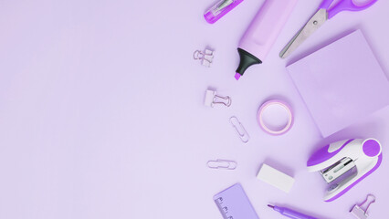 Set of stationery for work and study on purplle background. Back to school. .Top view, flat lay, copy space
