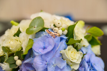 wedding rings on flower