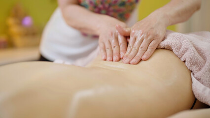 Fototapeta na wymiar Calming and Rejuvenating Massage for Women Back