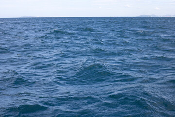 Fototapeta premium Blue sea water surface texture. Blue ocean summer