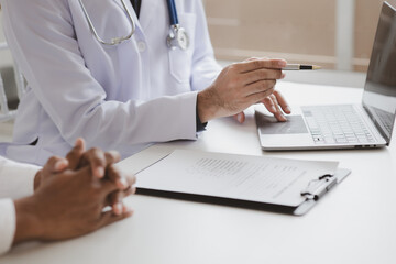 The doctor and the patient are discussing the details of the treatment, the results of the physical...