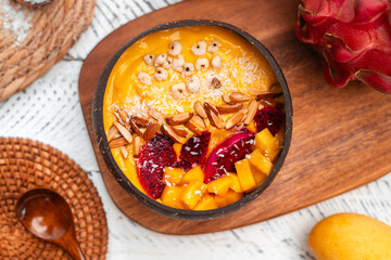 Mango Fruit Smoothie Bowl in Coconut Shell Cup