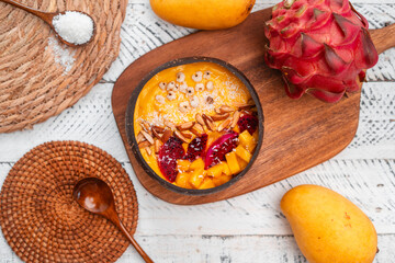 Mango Fruit Smoothie Bowl in Coconut Shell Cup
