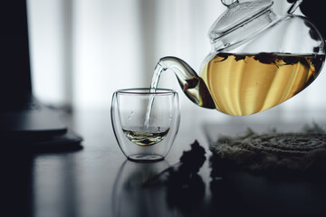 Hot rose tea in a glass