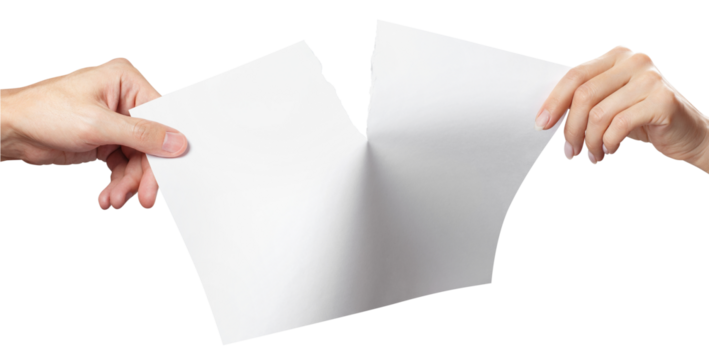 Hands tearing a sheet of white A4 paper in half, cut out
