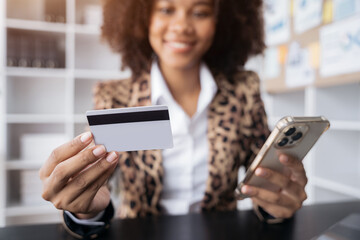 woman hand holding smartphone, tablet and using credit card for online shopping.Online shopping...