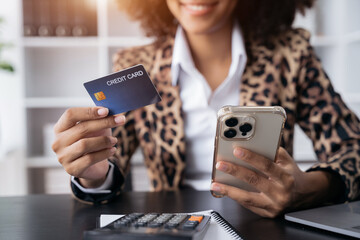 woman hand holding smartphone, tablet and using credit card for online shopping.Online shopping concept.