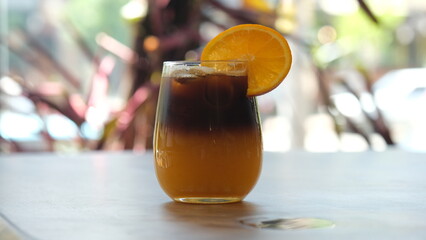 Orange coffee. orange juice and coffee mix