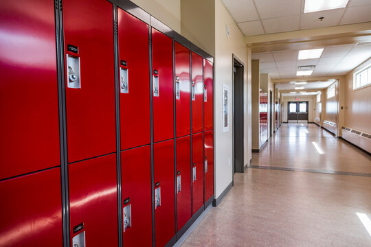 hallway and lockers in a recently renovated and upgraded rural high school; Namao, Alberta, Canada