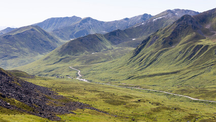 Road through Hatcher Pass at the Independence Mine State Historical Park in the Talkeetna Mountains; Palmer, Alaska, United States of America