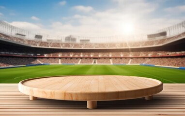 Fototapeta na wymiar Empty wooden table top product display showcase stage with large sports stadium background