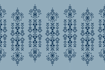 Ethnic geometric fabric pattern Cross Stitch.Ikat embroidery Ethnic oriental Pixel pattern navy blue background. Abstract,vector,illustration. Texture,clothing,frame,decoration,motifs,silk wallpaper.
