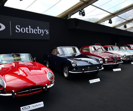 Paris, France - February 3, 2020: RM Sotheby's Paris 2020 at the Invalides in Paris. Global view of the event. There's Jaguar, Ferrari, Alfa Romeo and Mercedes cars.