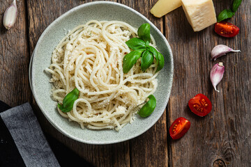 Spaghetti with parmesan cheese in a plate. Pasta with cheese