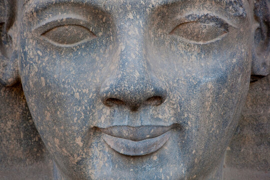 Sculptured face of Ramesses II in Luxor temple; Karnak, Egypt