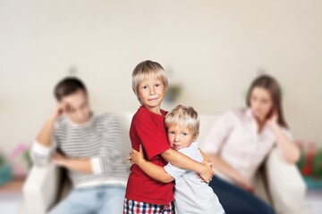 Sad child, fighting parents in living room