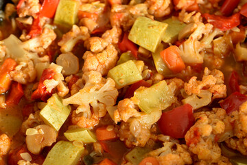 Vegetable stew cooked in a frying pan.