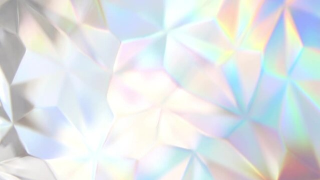 Relax video footage of slow motion soft focus holographic iridescent background. Abstract calm colourful video cover. Multicolour low poly effect wallpaper. Can use in vertical position.