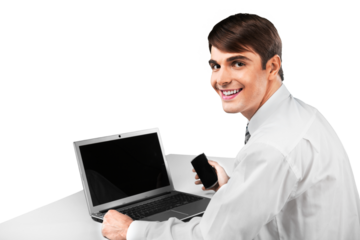 Portrait of a Businessman Working with Laptop and Holding Smartphone