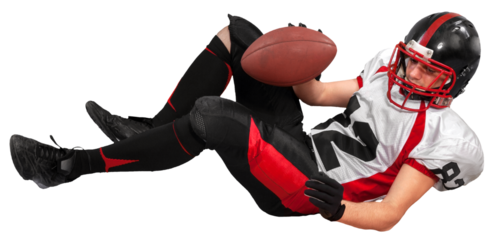 Football Player Lying Down and Holding Ball - Isolated