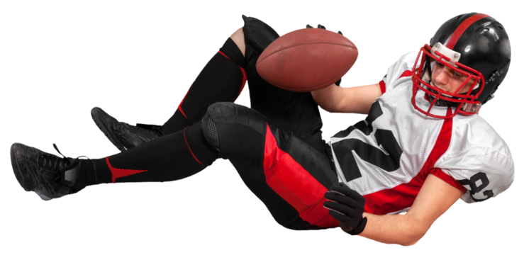 Football Player Lying Down and Holding Ball - Isolated