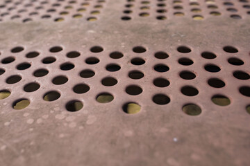 holes on a metal surface