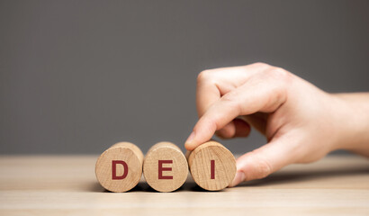 Wooden blocks with the word DEI - Diversity equity inclusion. Values held by many organizations...