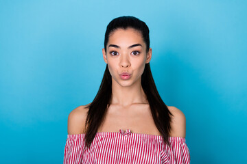 Fototapeta premium Photo of flirty girl dressed off shoulders striped blouse plump lip sending kiss empty space isolated blue color background