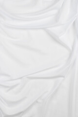 Obraz premium white cotton fabric draped, bed linen