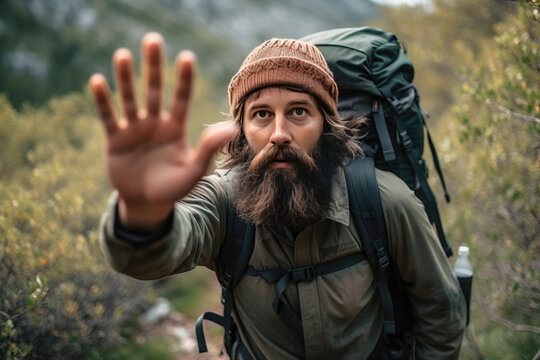 Generative AI illustration of bearded male traveler showing stop gesture in nature