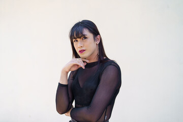 Naklejka premium Portrait of Happy Asian transgender. LGBTQIA wearing make up woman clothes.