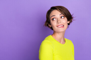 Portrait of funny young dreaming woman bob brown hair look admiring empty space wish buy new skirt isolated on purple color background