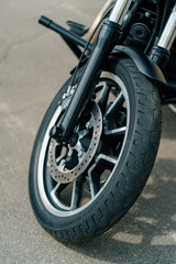 Close up wheel of a powerful off-road motorcycle concept of motorsport or active lifestyle side view