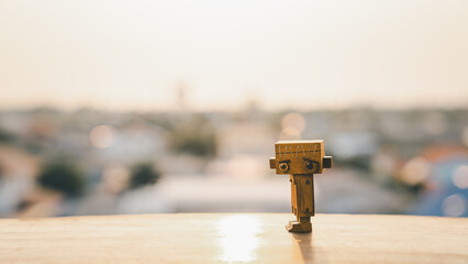 The wooden robot sat sadly in the city. Concepts of mental health, depression, panic and suicide.	