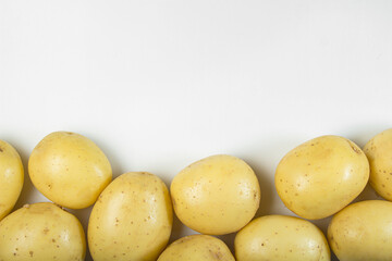 Young potatoes on a white background