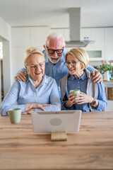 senior mature family or friends use digital tablet online video call