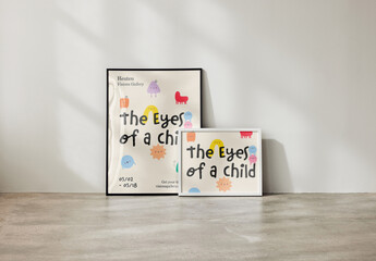 Mockup of two customizable poster frames size 61 x 91.5cm and 50 x 40cm, vertical and horizontal format, leaning against wall