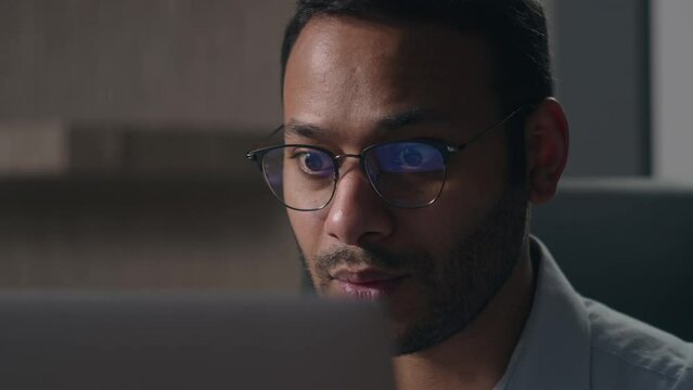Indian shocked stressed amazed bad wonder businessman shock Arabian man American confused worker employer looking with big eyes in laptop computer screen afraid scare negative office business failure