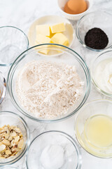 Lemon poppy seed muffins garnished with almond slivers
