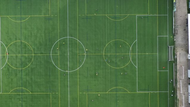 Football field aerial view, public soccer court for training and competition in city.