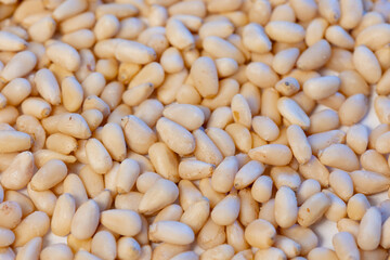 Siberian pine nuts of cedar, macro texture background
