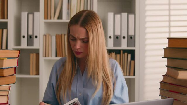 Stressed angry tired Caucasian student girl woman stressful learner business corporate studying with laptop and books problem bad result homework prep to exams learning trouble e-learning difficulties